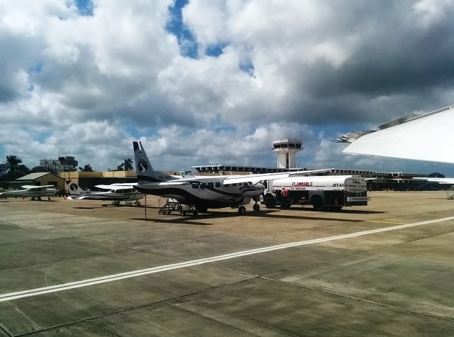 Watched a Tropic Air plane getting fueled up on our pit stop at Philip Goldson International Airport philip goldson airpirt belize
